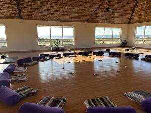 Yoga studio set up looking out at the Pacific ocean