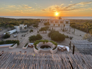 Looking out at the sunset from the rooftop patior
