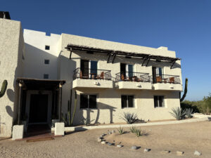 Picture of the main building. Clear blue skies.