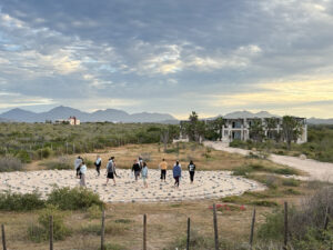 Group of people walking a labrinth