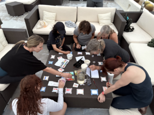 A group of people doing water color outside